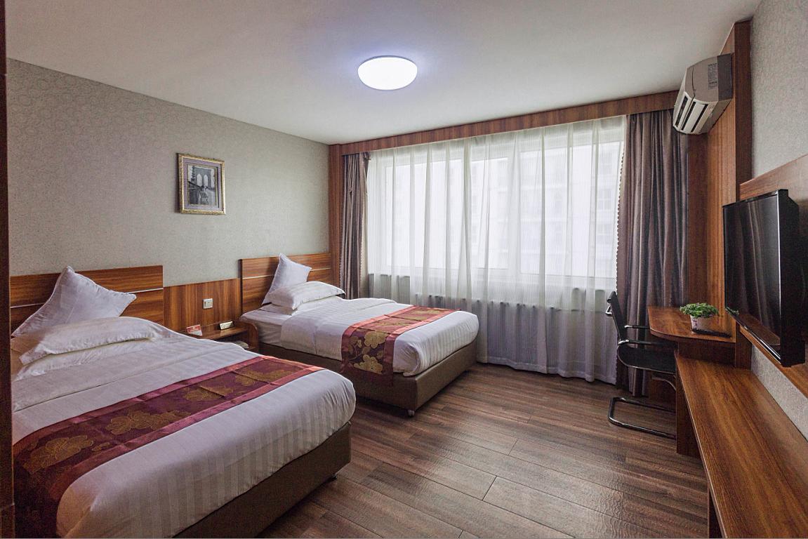 Beiguo Zhichun Business Hotel Manzhouli Exterior foto